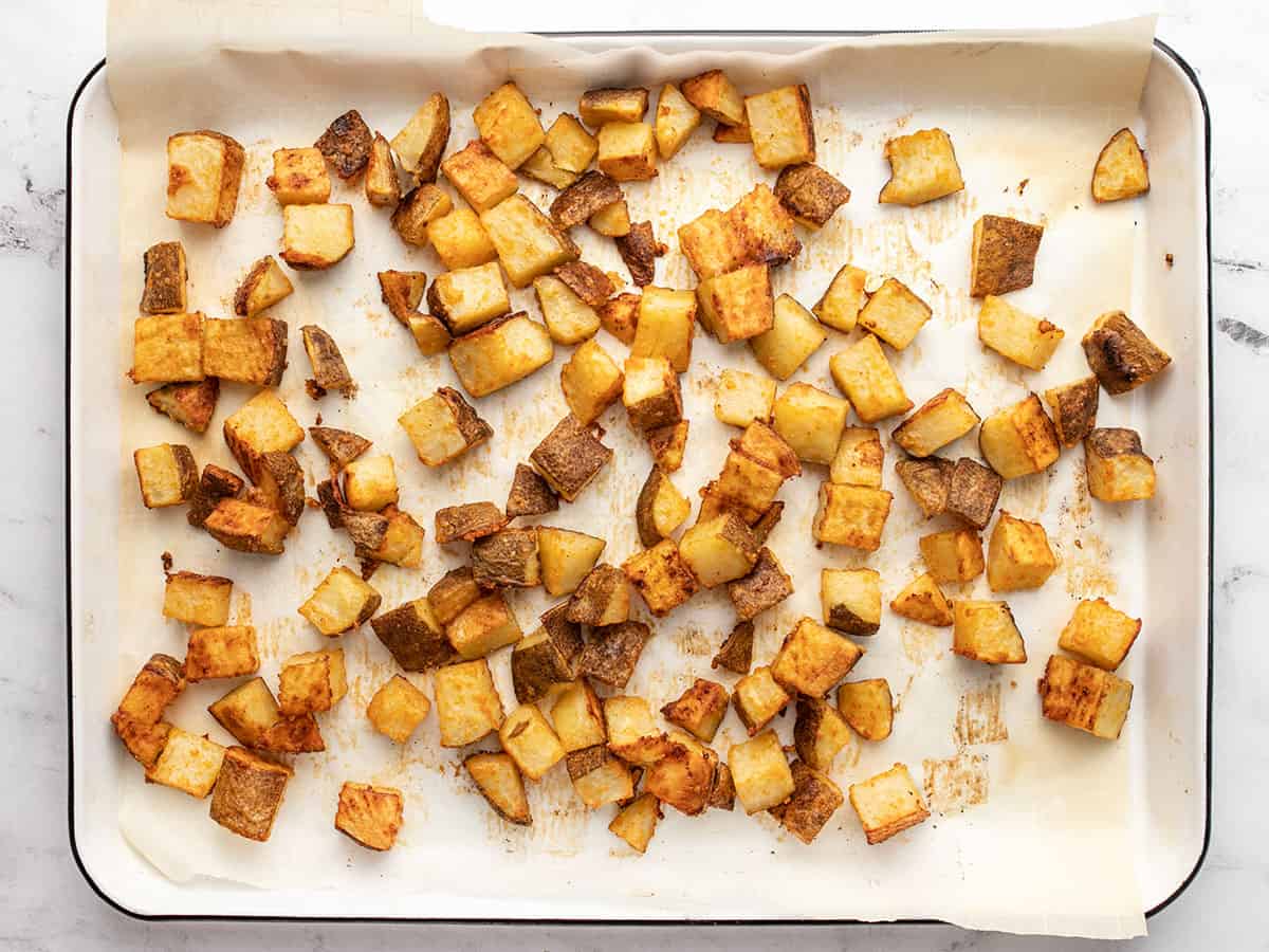 Roasted potatoes on a sheet pan.
