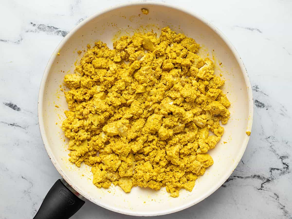 Cooked tofu in the skillet.