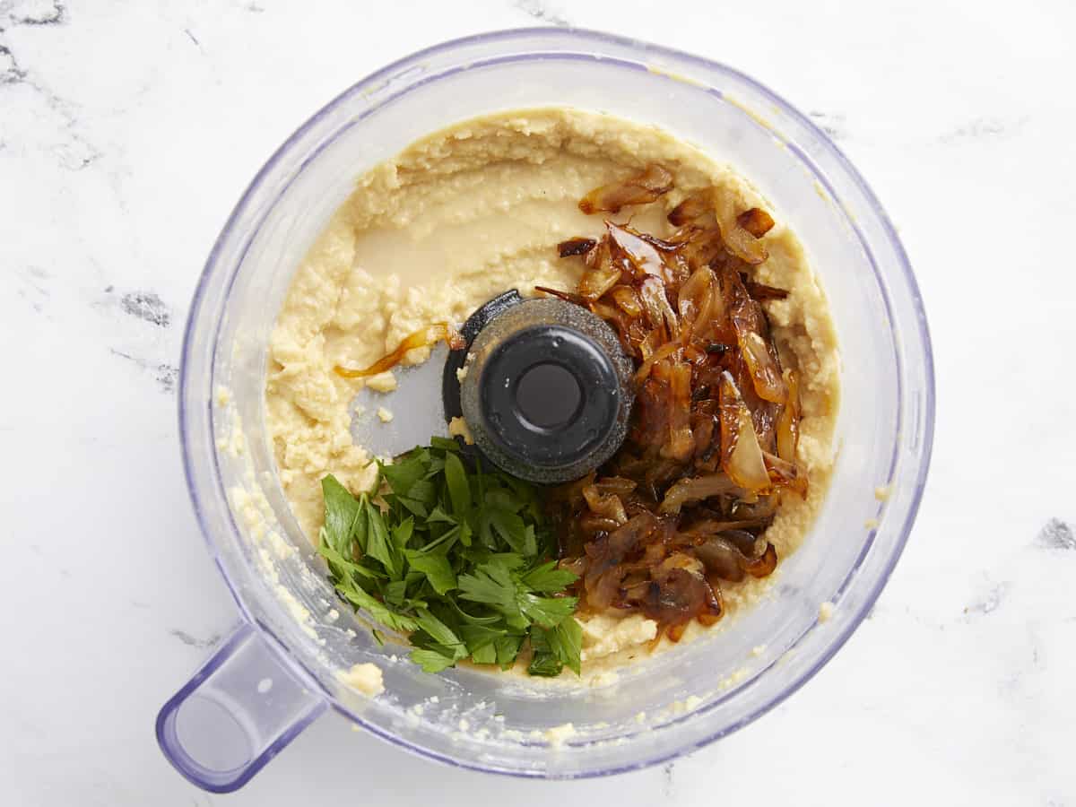 Caramelized onions and parsley added to the food processor.