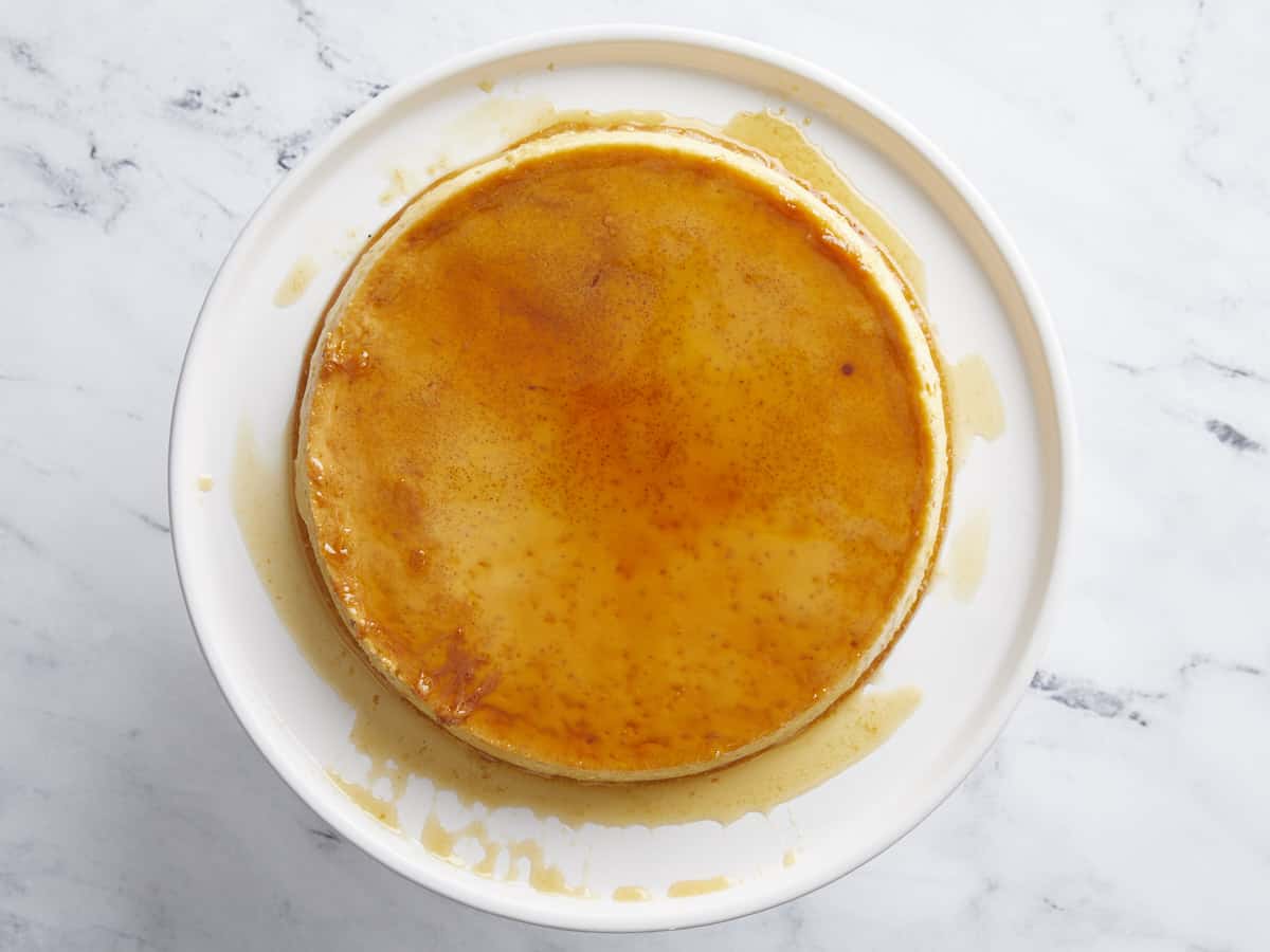 Finished flan flipped over onto a plate.
