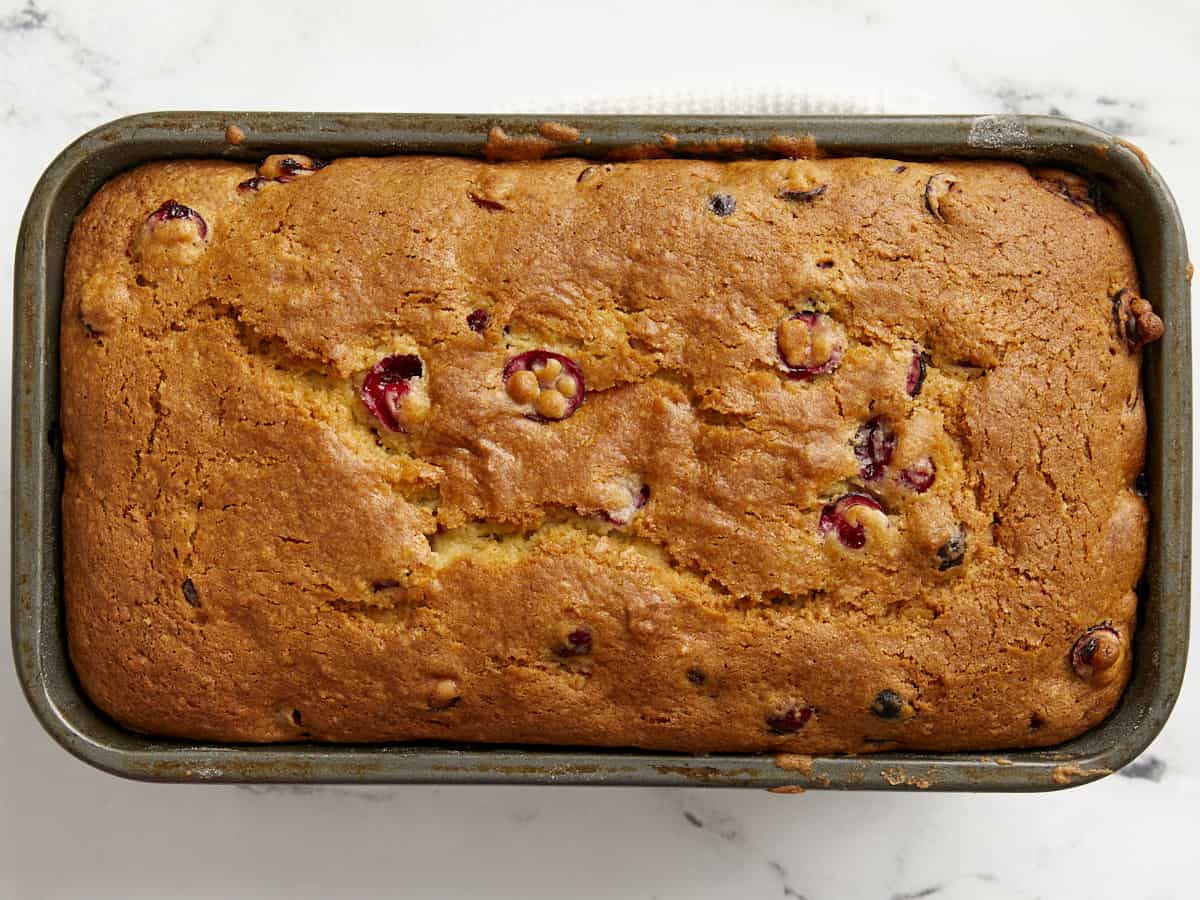 Baked cranberry orange bread in the bread pan.
