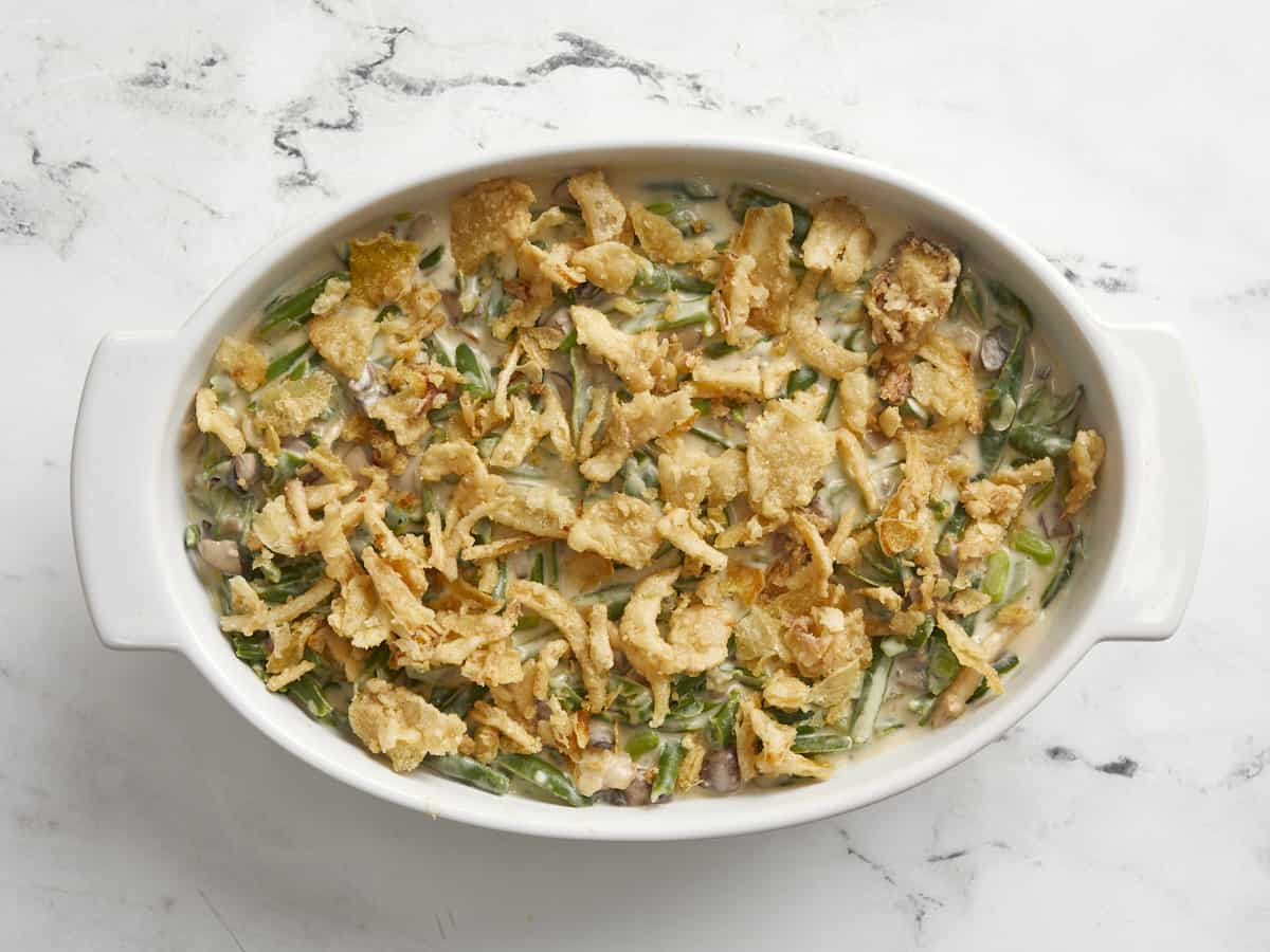 Green bean casserole in transfered to a baking dish.