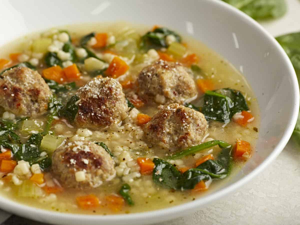 Side view of Italian Wedding Soup in a bowl.