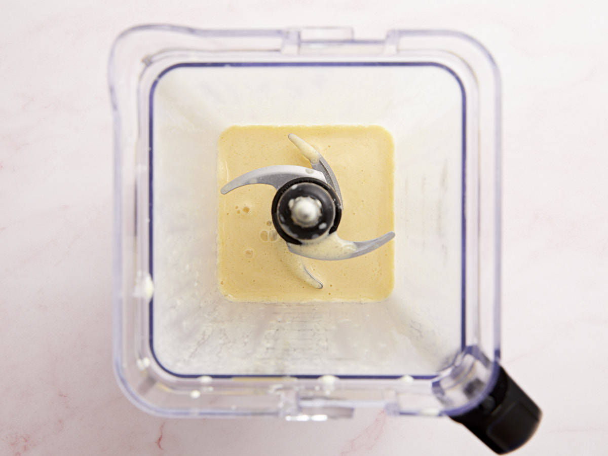 Blended Orange Julius in a blender from above.