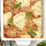 Overhead view of zucchini lasagna in a baking dish