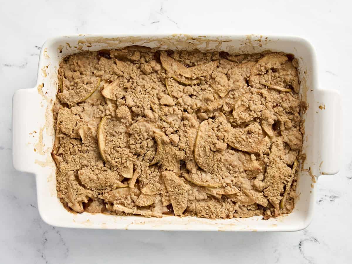 Baked apple crumble in a rectangular baking dish.