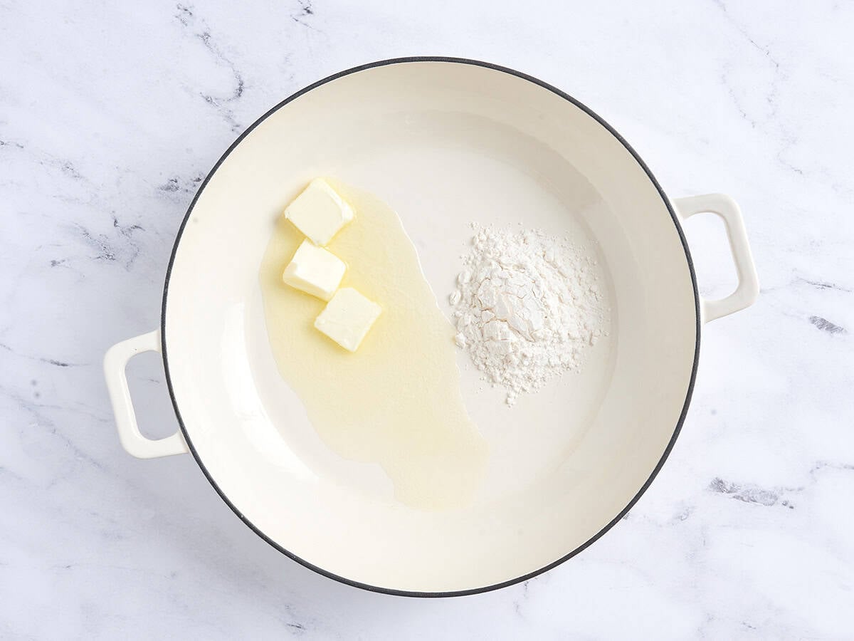 Butter and flour in a skillet to make a roux.