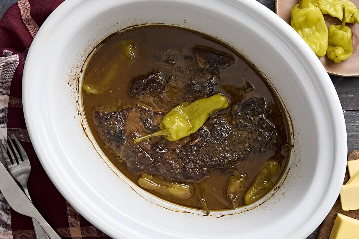 Overhead view of mississippi pot roast in a crockpot.