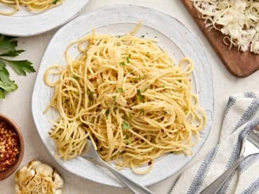 Overhead view of Spaghetti Algio e Olio on a plate with a fork.
