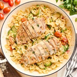 Overhead view of Overhead view of Pasta Primavera with chicken in a skillet.