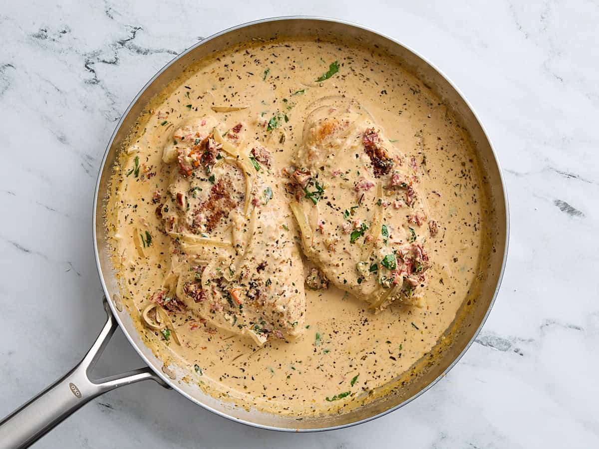 Finished marry me chicken in a skillet, ready to serve.