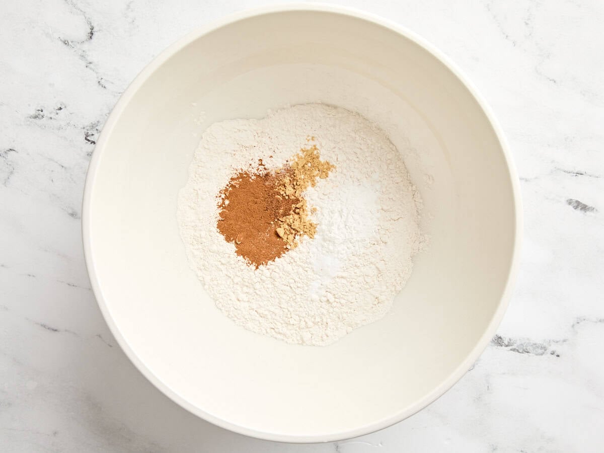 The dry ingredients to make carrot cake in a bowl.