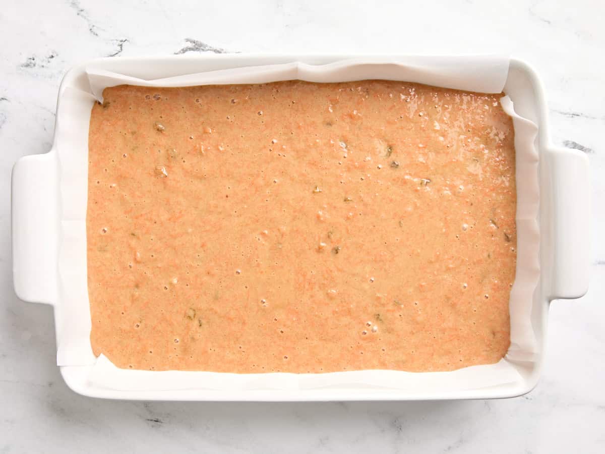 Carrot cake batter in a baking dish.