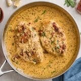 Overhead view of a marry me chicken recipe in a skillet.