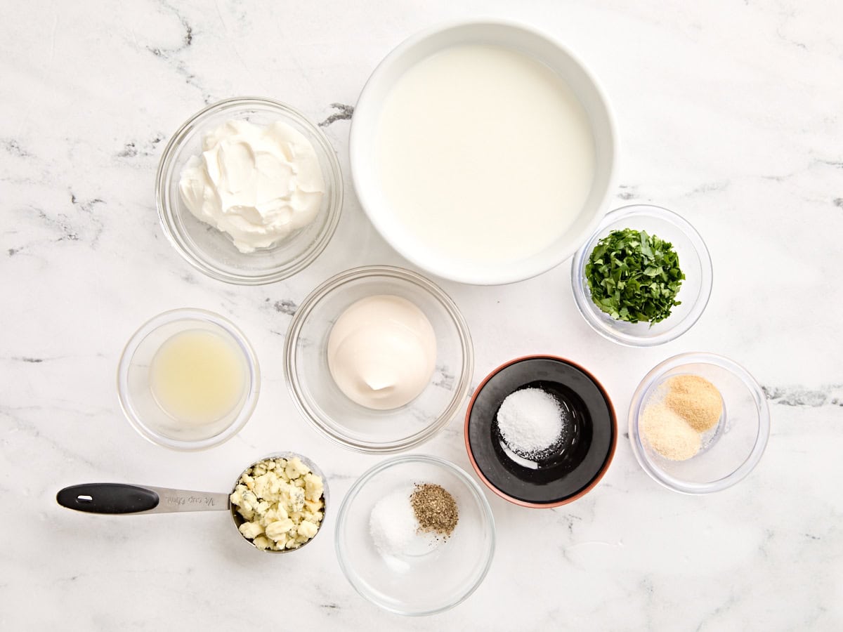 The ingredients to make a homemade blue cheese dressing.