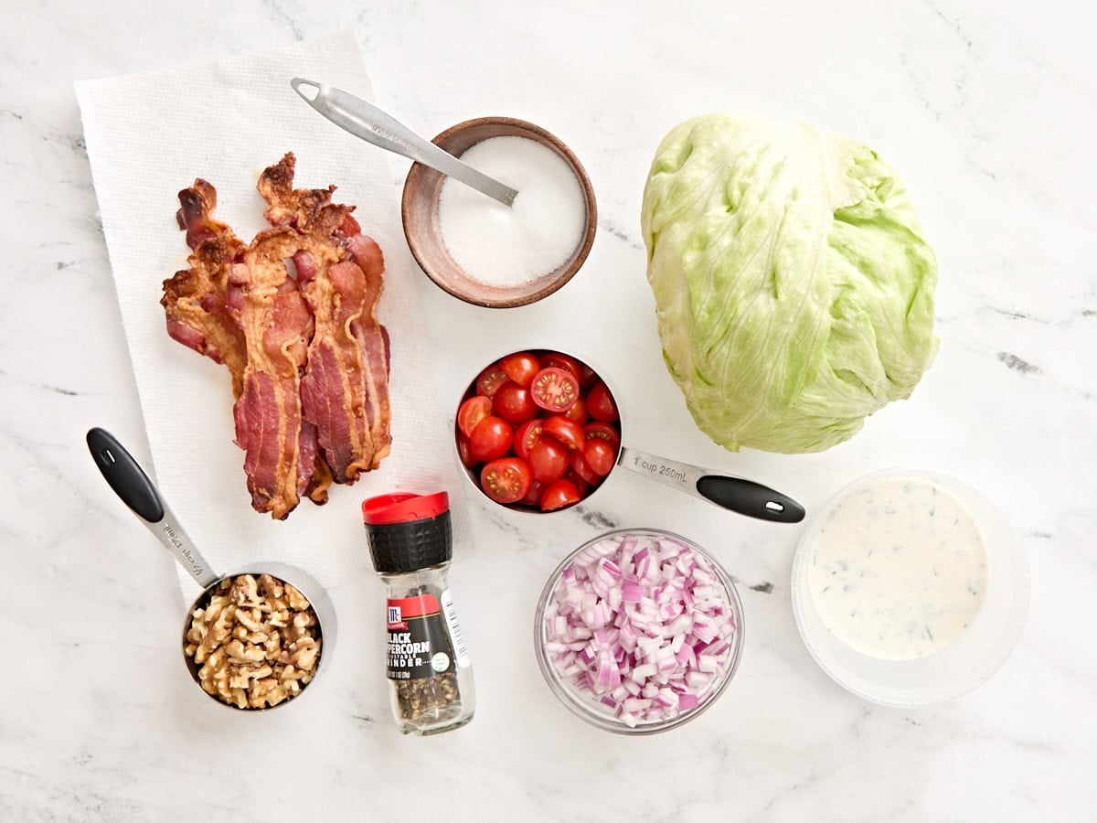 The ingredients to make a wedge salad.