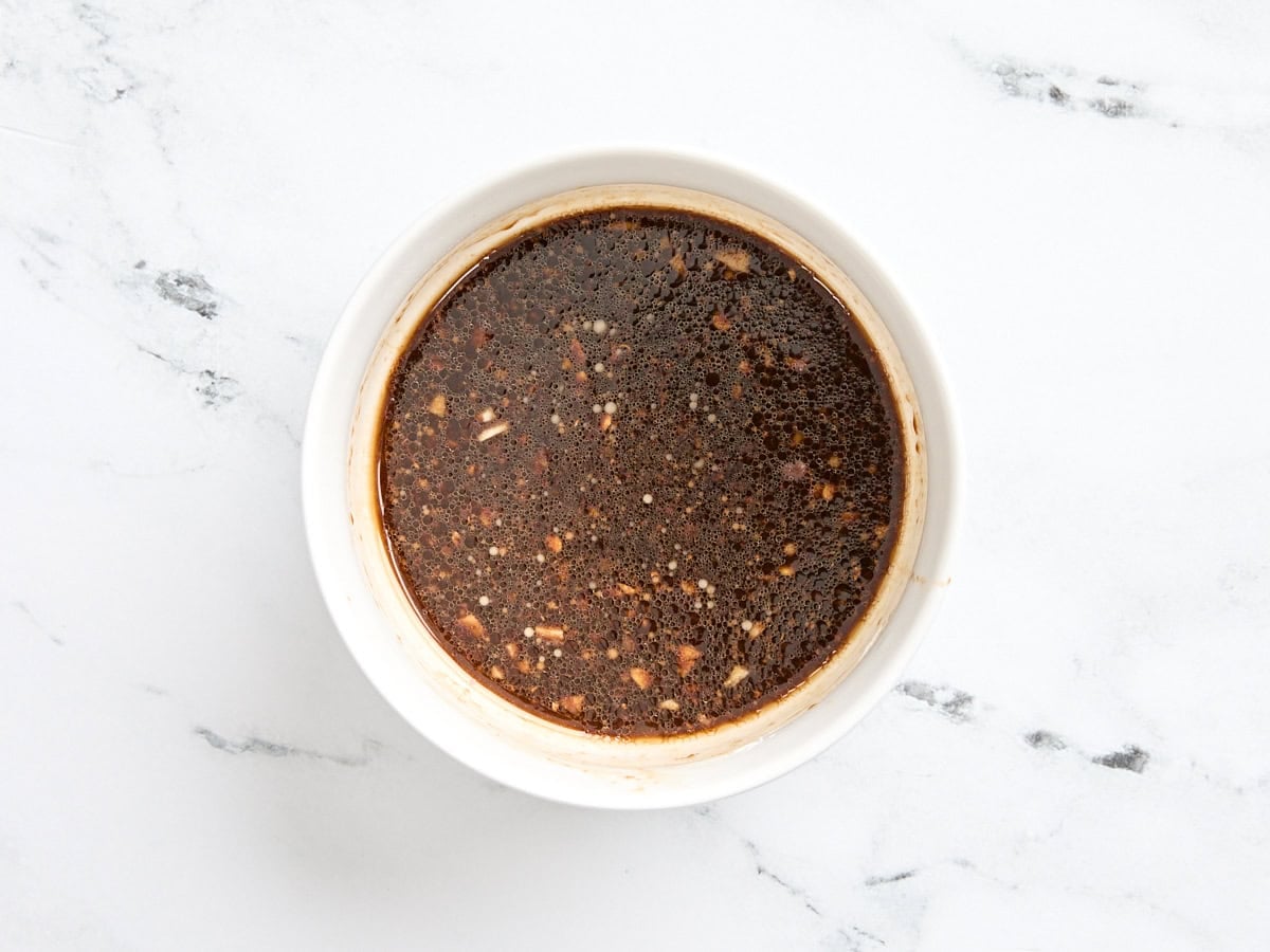 A brown sugar and soy sauce sauce in a bowl.