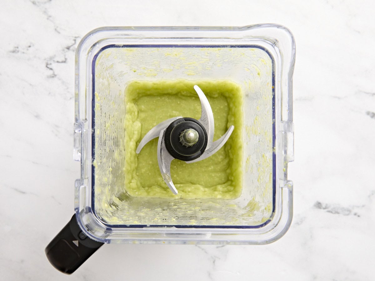 Avocado margarita in a blender after blending.
