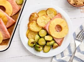 Overhead view of a sheet pan easter dinner on a plate.