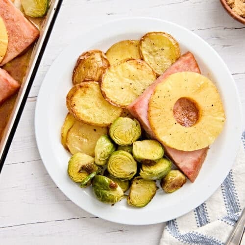 Overhead view of a sheet pan easter dinner on a plate.