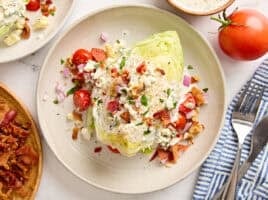 Overhead view of a wedge salad on a plate.
