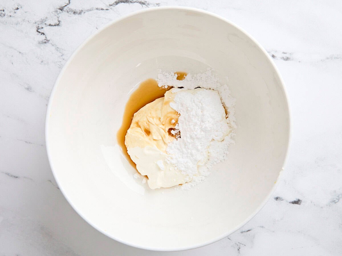The ingredients for fruit dip in a mixing bowl.