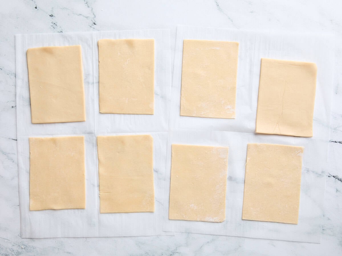 A pie crust cut into 8 rectangles.