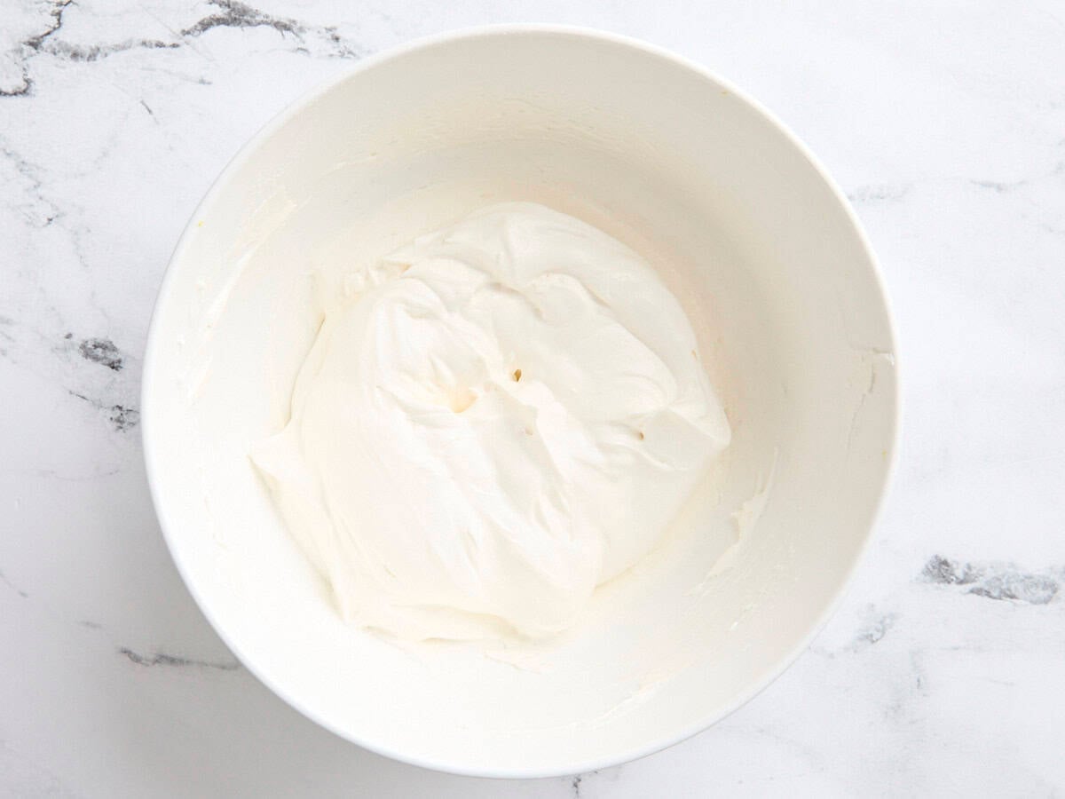 Finished fruit dip in a mixing bowl.