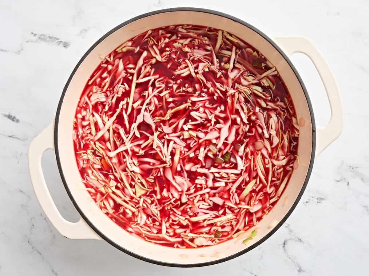 Homemade borscht in a sauce pan before boiling.