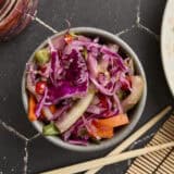 Overhead view of homemade kimchi in a bowl.