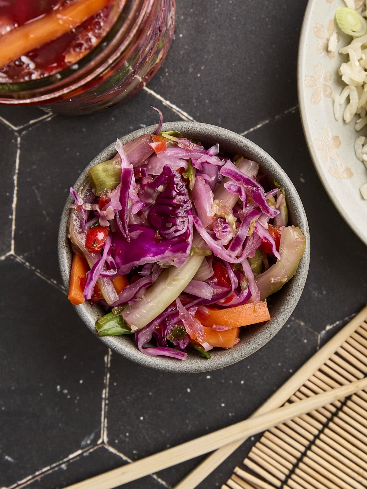 Overhead view of homemade fermented vegetables in a bowl.