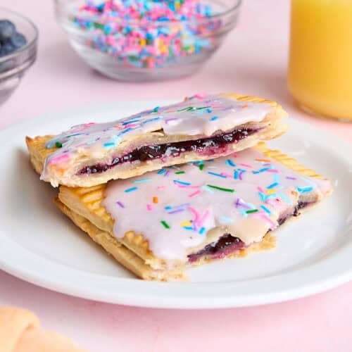A homemade blueberry pop tart on a plate.