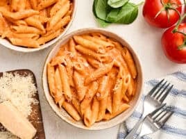 Overhead view of a bowl of pasta with homemade vodka sauce.