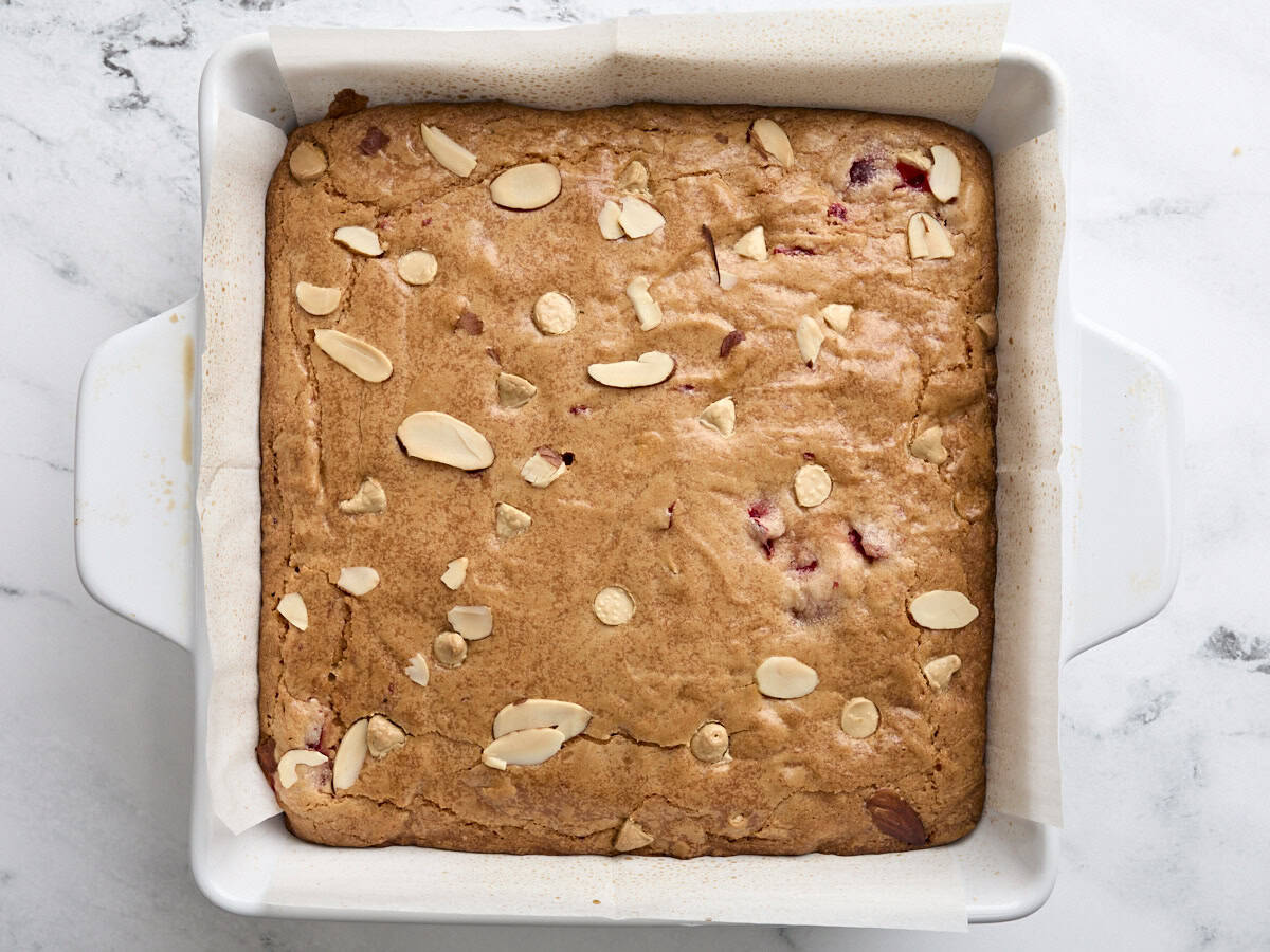 Finished homemade cherry blondies in a baking dish.