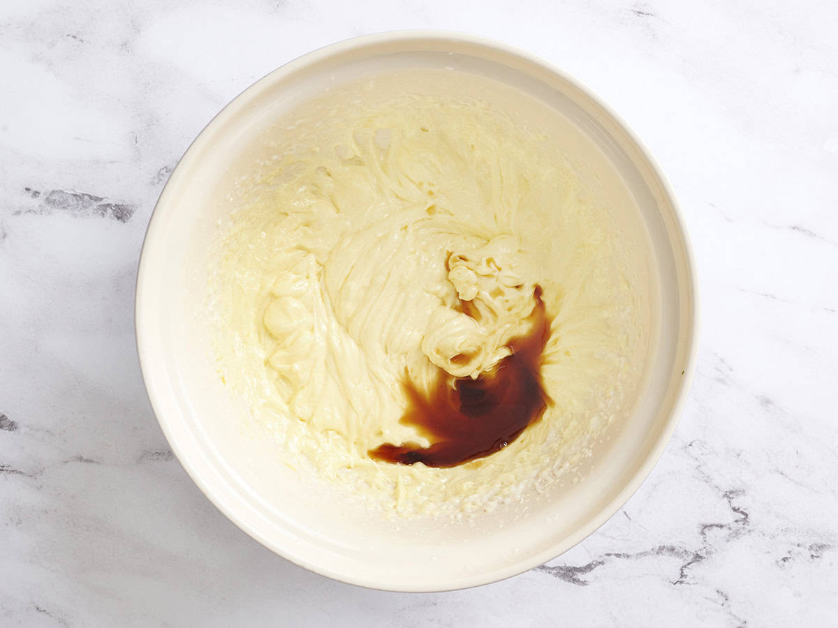 Vanilla added to a beaten butter and sugar mix.