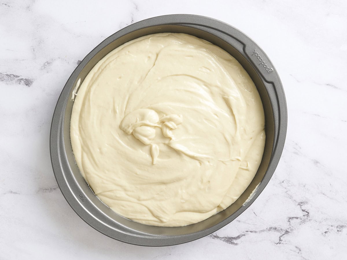 Vanilla cake batter in a baking dish.