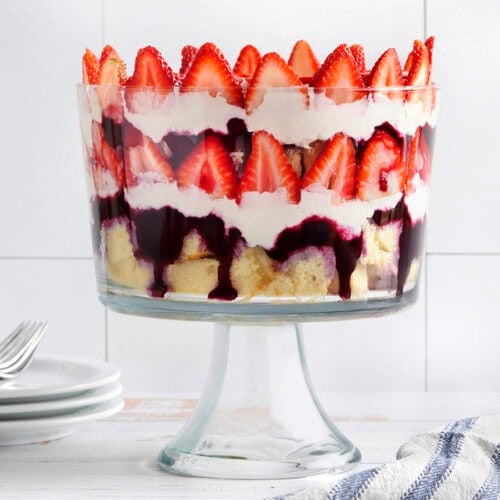 Side view of a homemade red white and blue trifle in a trifle dish.