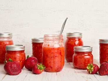 Side view of multiple jars of freezer jam.