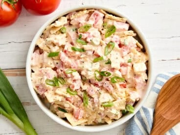 Overhead view of a bowl of tomato cracker salad.