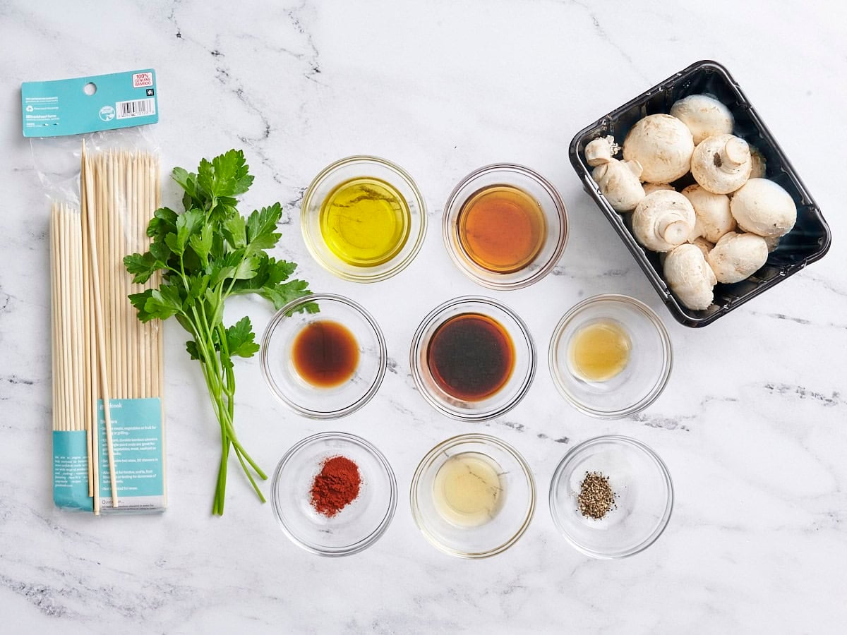 The ingredients to make smoky grilled mushroom kebabs.