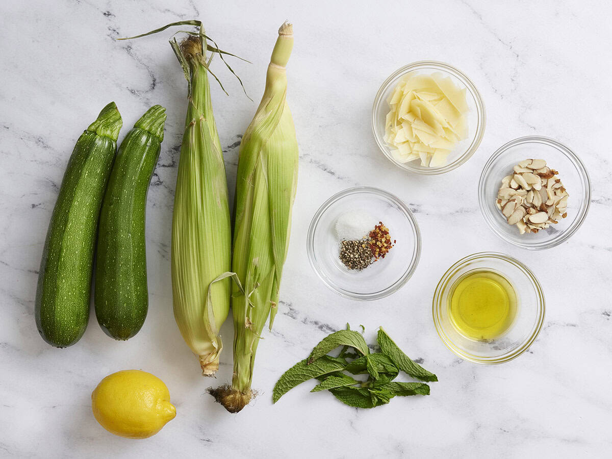 The ingredients for zucchini, corn and toasted almond salad.