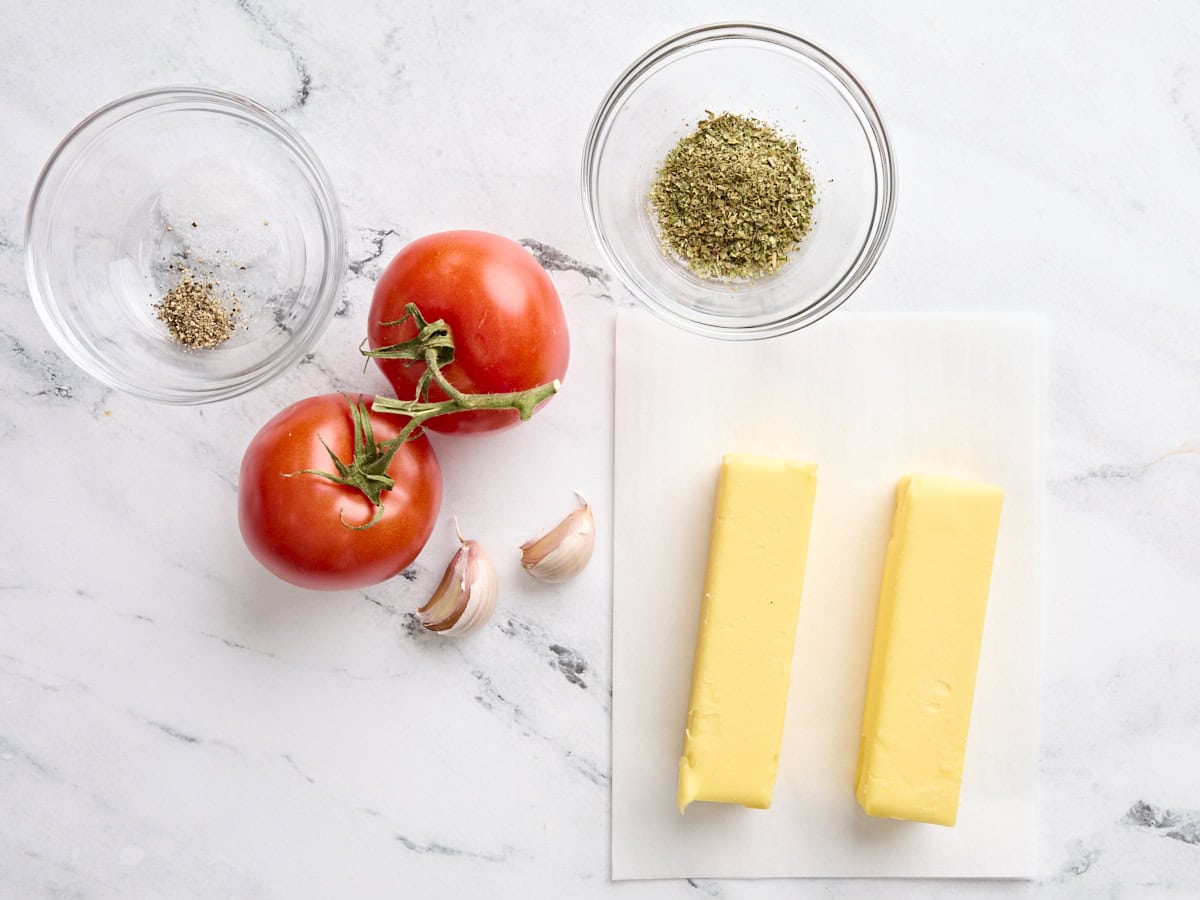 The ingredients to make tomato butter.