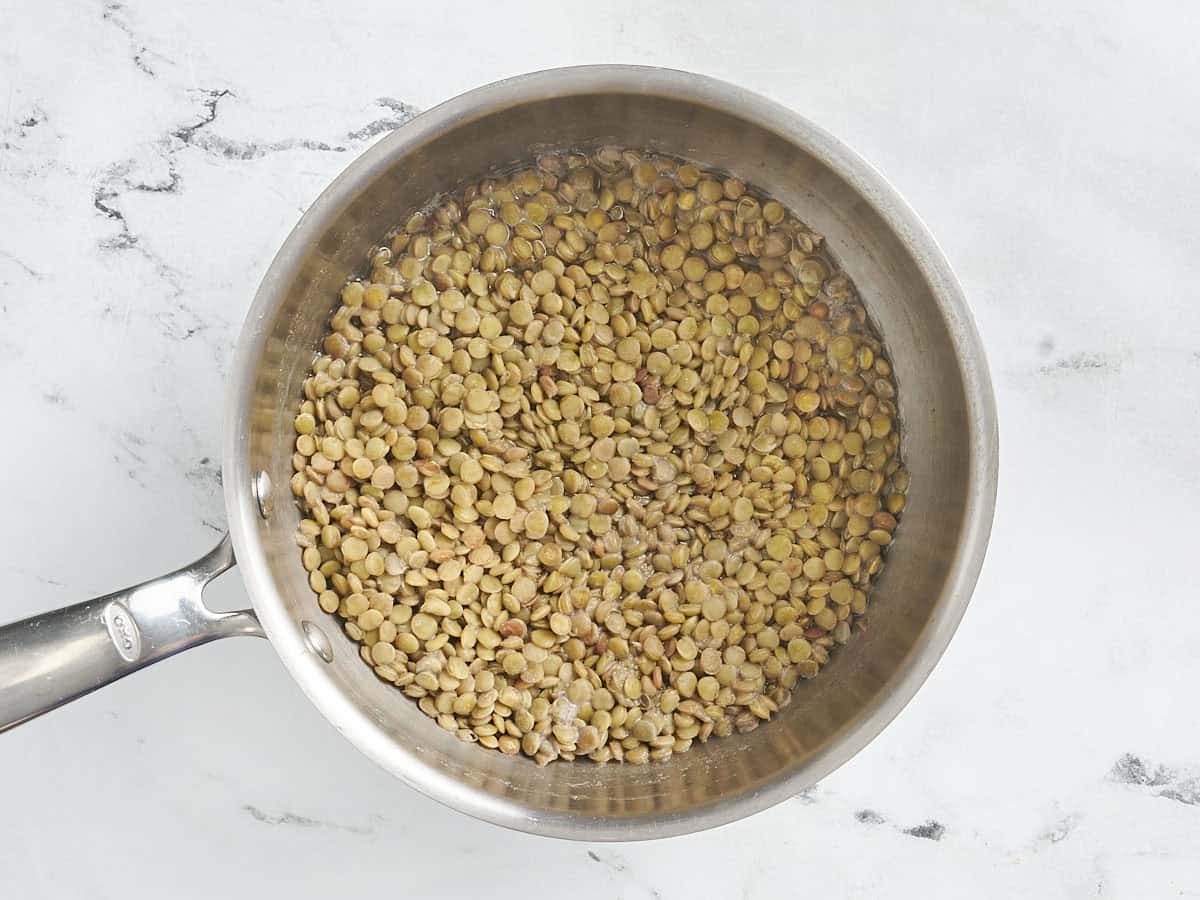 Cooked lentils in a pot.