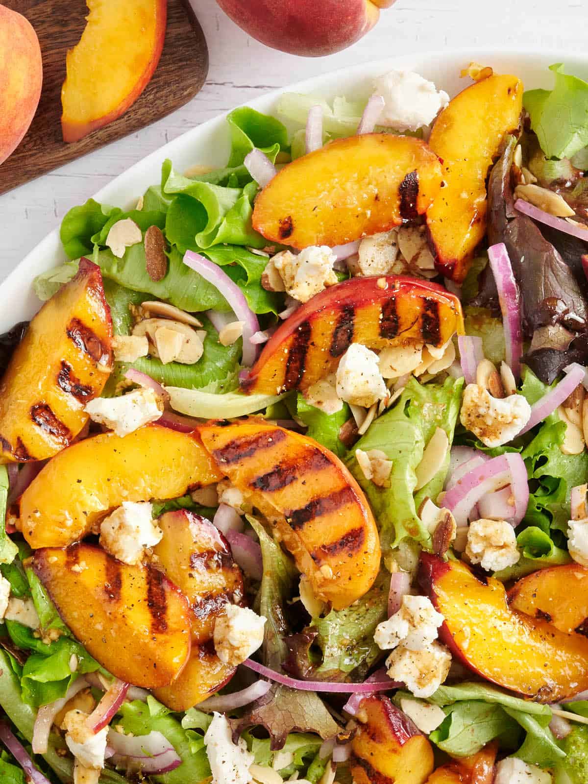 Overhead close up of a grilled peach salad.