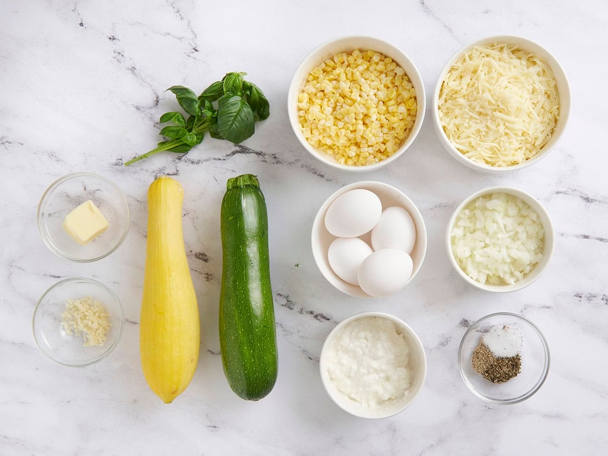 The ingredients to make sweet corn and zucchini pie.
