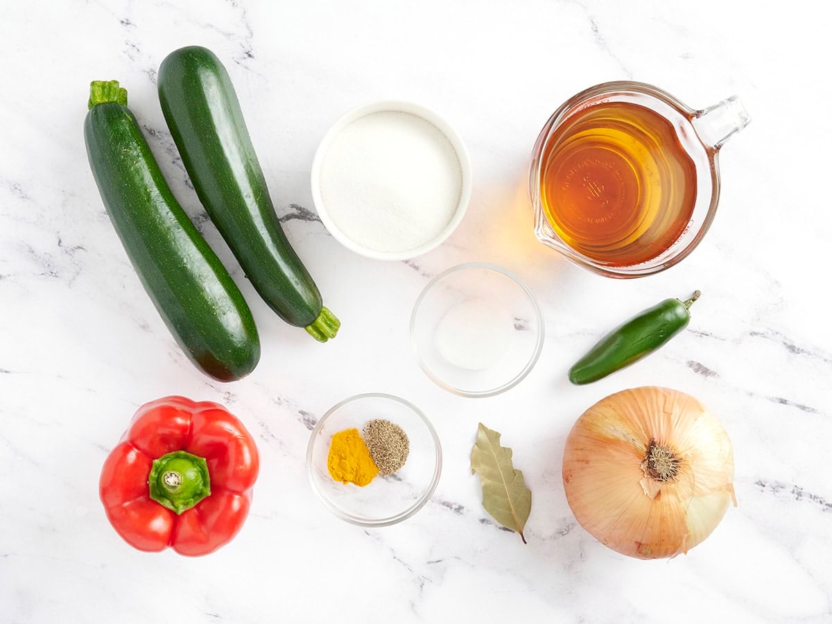 The ingredients to make zucchini relish.