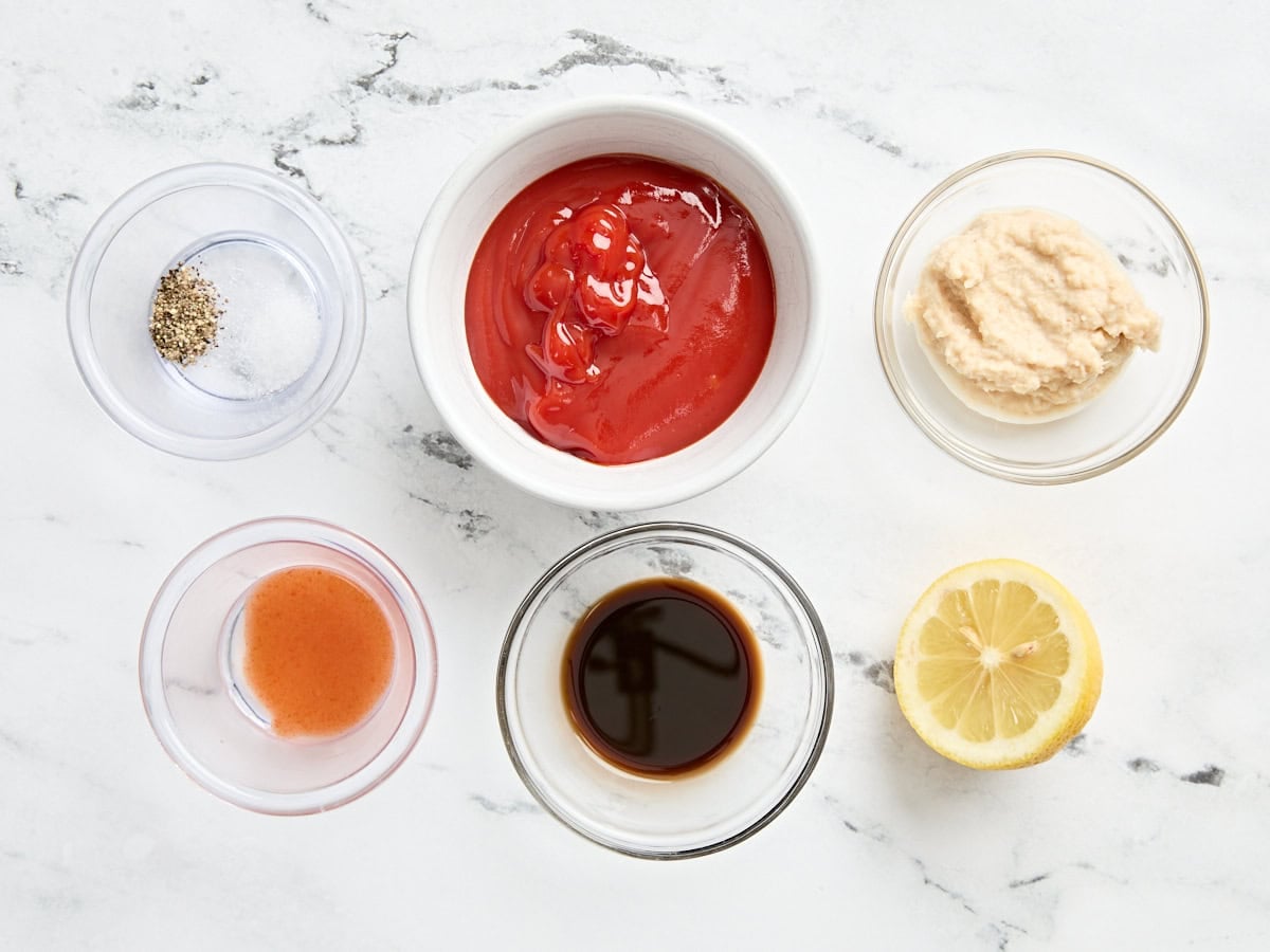 The ingredients to make a shrimp cocktail sauce.