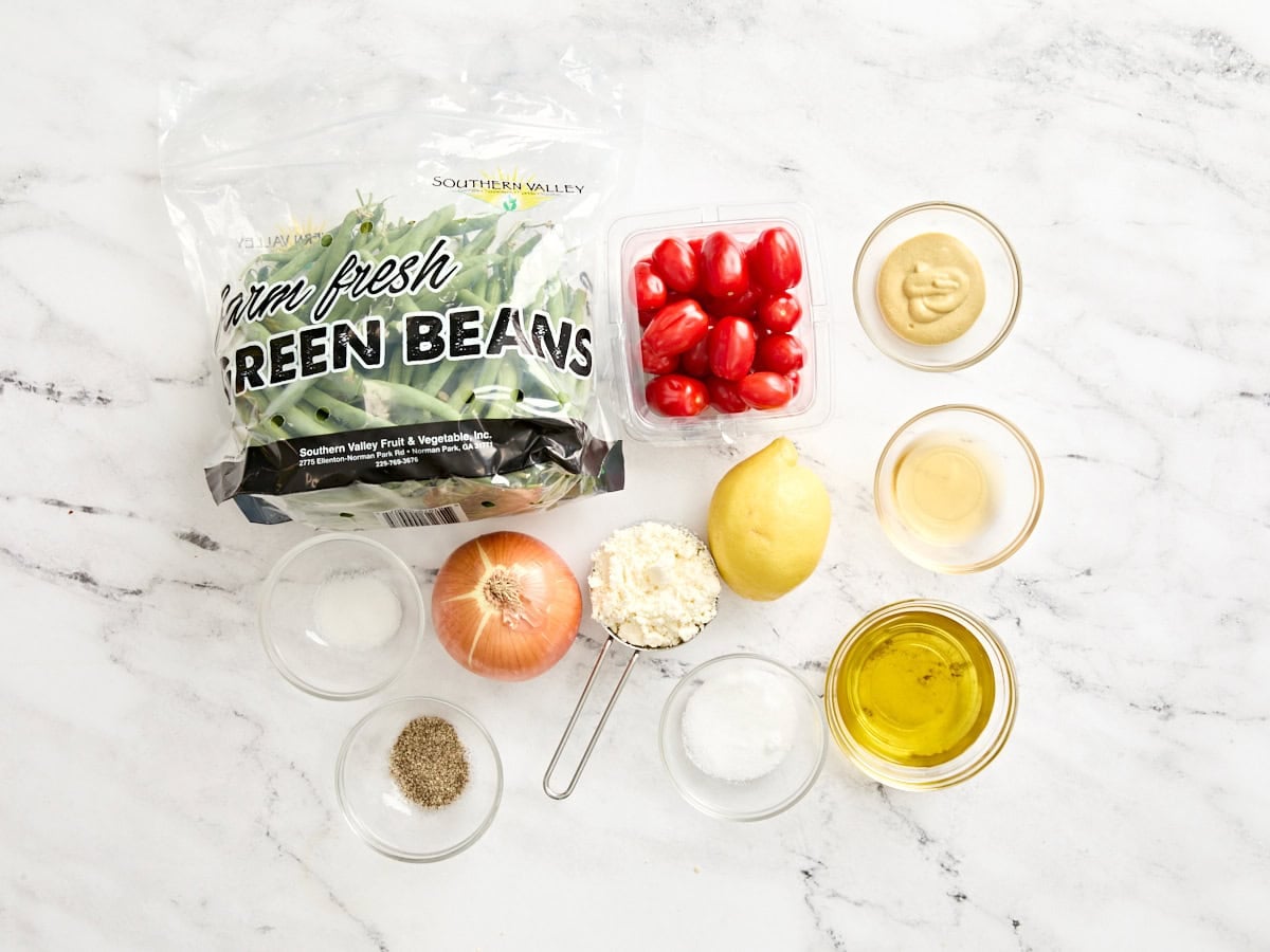 The ingredients to make a green bean salad.