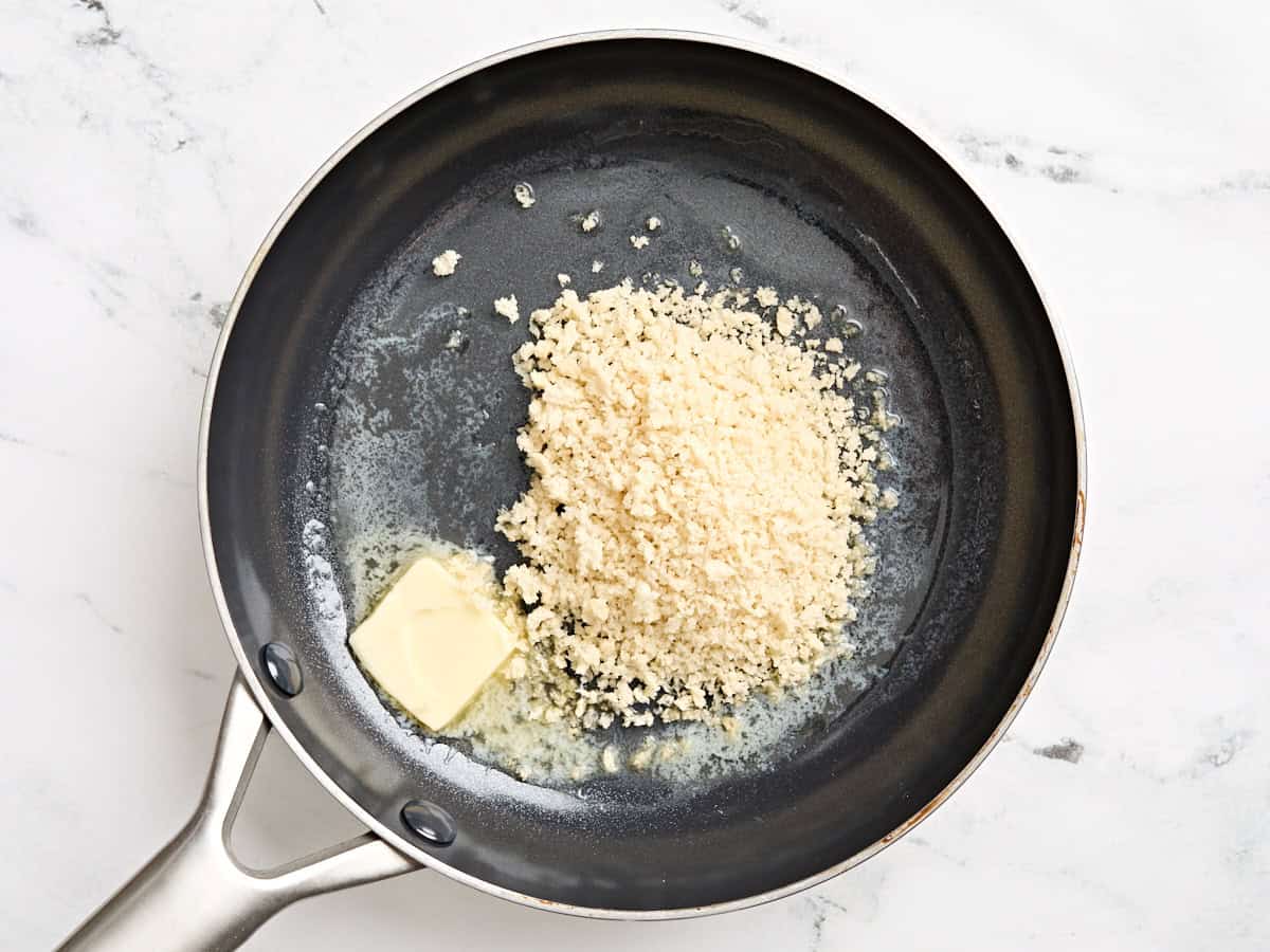 Panko breadcrumbs and butter in a skillet.