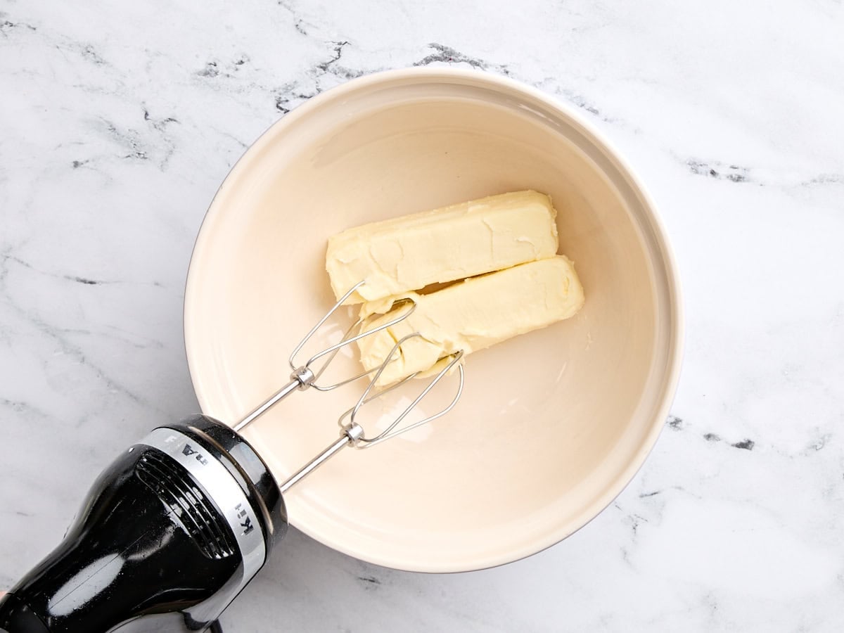Butter in a mixing bowl with a handmixer.